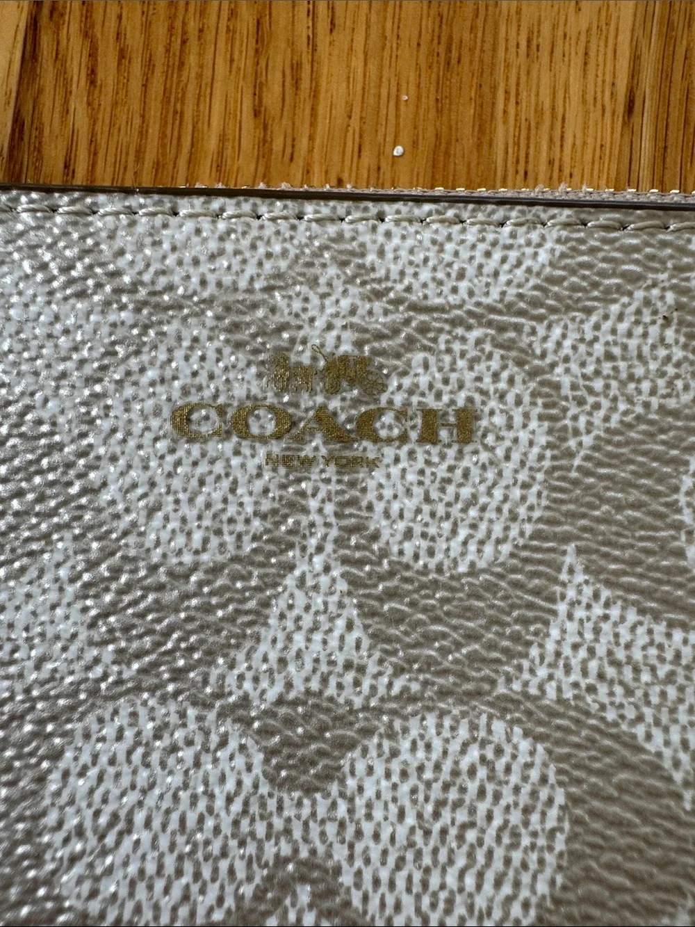 Coach Metallic Signature Corner Zip Wristlet in Pearlized Canvas Gold Accents